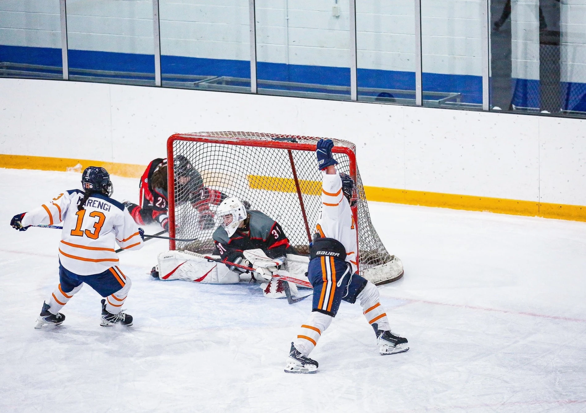 Tenley Marengi, number 13, playing near the net in her Masters uniform