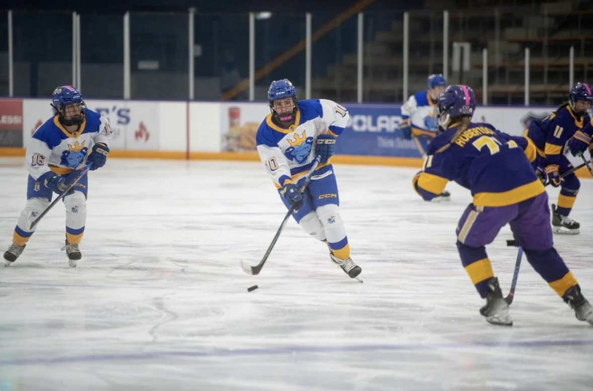 Tenley Marengi with puck